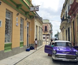 A guest arriving to Hostal La Caridad in Old Havana