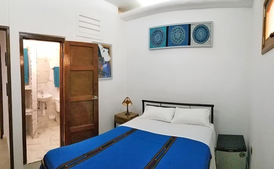 The blue room in Malecon Sunset guesthouse in Havana